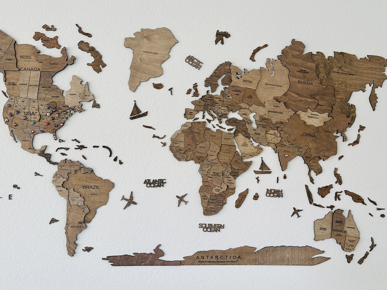 World map — sourcing origins connected to export markets